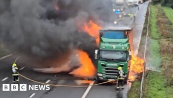 Drivers asked to stay in cars as fire closes M5