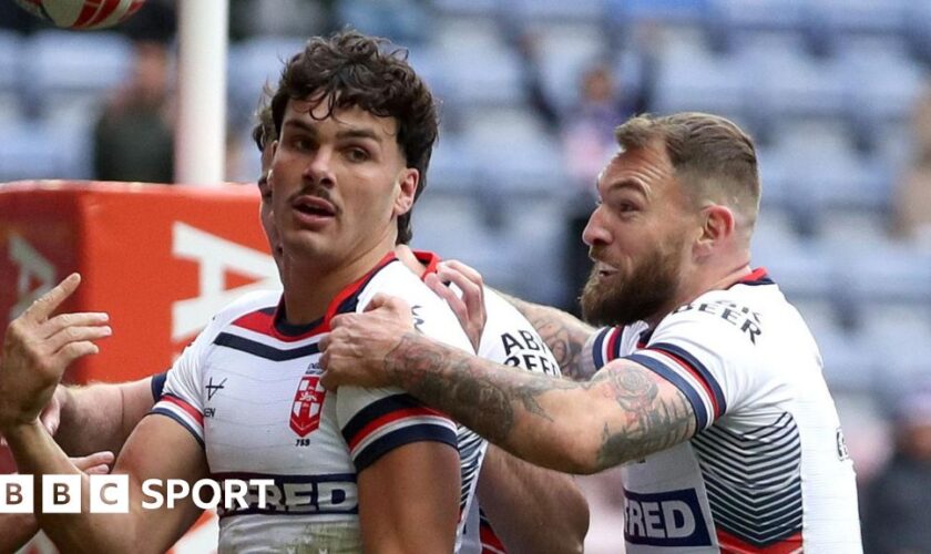 England players celebrate after scoring their first try