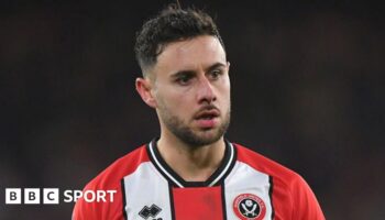 George Baldock playing for Sheffield United in the Premier League