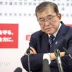 Japan PM vows to continue ruling despite bruising loss