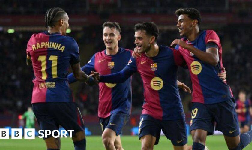 Barcelona players celebrate a goal