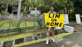 Retienen a dos valencianos de luna de miel en Singapur por protestar frente a la casa de Peter Lim