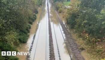 Roads flooded, trains cancelled and schools close