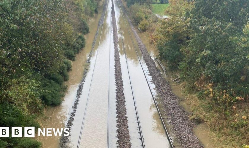 Roads flooded, trains cancelled and schools close