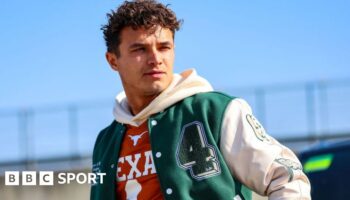 Lando Norris wearing a green and white bomber jacket at the Circuit of the Americas before the United States Grand Prix weekend