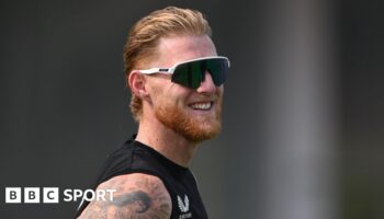 England captain Ben Stokes smiles while wearing sunglasses