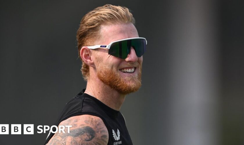 England captain Ben Stokes smiles while wearing sunglasses