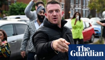 Tommy Robinson admits contempt of court over false claims about refugee