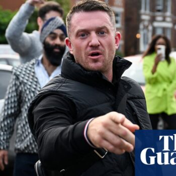 Tommy Robinson admits contempt of court over false claims about refugee