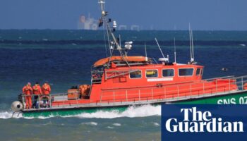 Two people dead and 46 rescued after boat sinks in Channel