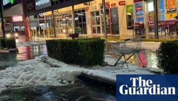 Wild weather lashes Queensland, with rainstorms bringing down ceilings and hail falling like snow