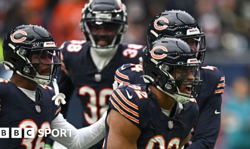 Daniel Hardy celebrates with his Chicago Bears team-mates