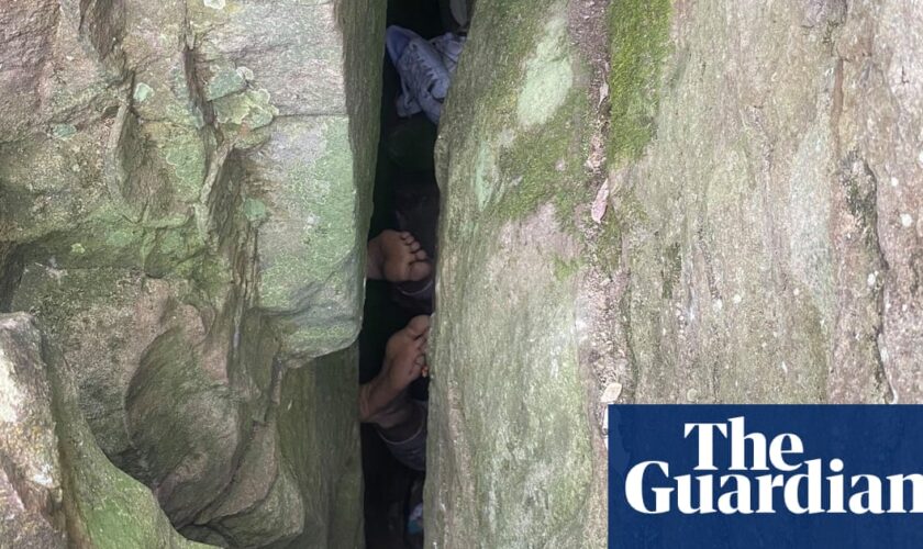 Woman wedged upside down between boulders for seven hours after trying to retrieve phone in regional NSW