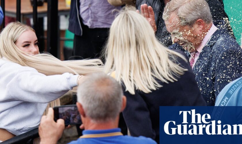 Woman who threw milkshake over Nigel Farage admits assault