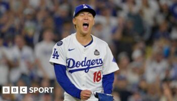 Los Angeles Dodgers pitcher Yoshinobu Yamamoto celebrates