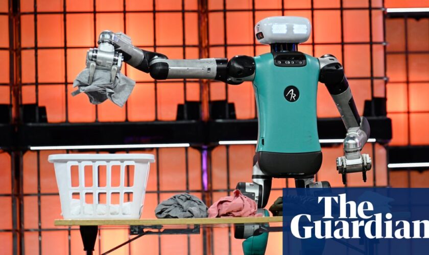 ‘A fork in the road’: laundry-sorting robot spurs AI hopes and fears at Europe’s biggest tech event