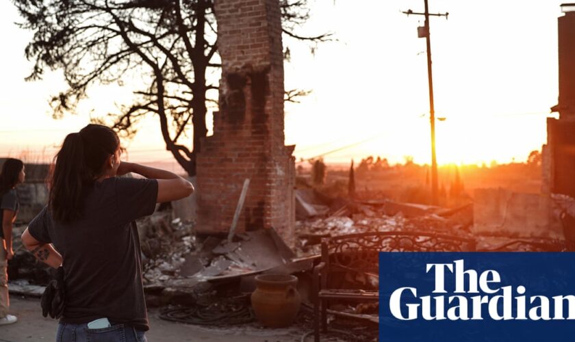 ‘Devastating’: California fire victims return to sift through rubble of homes