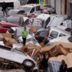 Vehicles are seen piled up after being swept away by floods in Valencia, Spain, Thursday, Oct. 31, 2024. (AP Photo/Alberto Saiz)