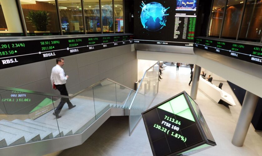 File photo dated 04/10/16 of an electronic ticker tape showing the FTSE 100 inside the London Stock Exchange. The FTSE 100 is celebrating its 40th anniversary, as firms from Barclays to Sainsbury's remain a fixture of the UK's top stock market index. Dubbed the Footsie, the index containing the biggest 100 companies on the London Stock Exchange (LSE) launched on January 3 1984. Issue date: Wednesday January 3, 2024. Pic: Nicholas .T. Ansell