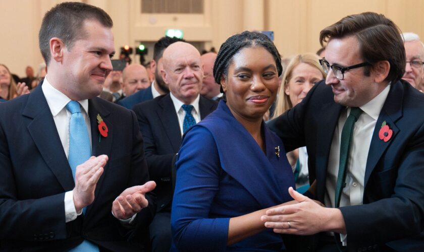 Kemi Badenoch is congratulated by her husband, Hamish. Pic: PA