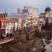 Crashing waves in a hilltop village, a night of terror from Spain's floods