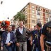 King Felipe is heckled and has mud thrown at him by furious locals during visit to flood-hit Valencia - as rescuers continue desperate search for thousands still missing