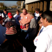 Church minister Michael Hildreth leads the group in prayer before they go out campaigning