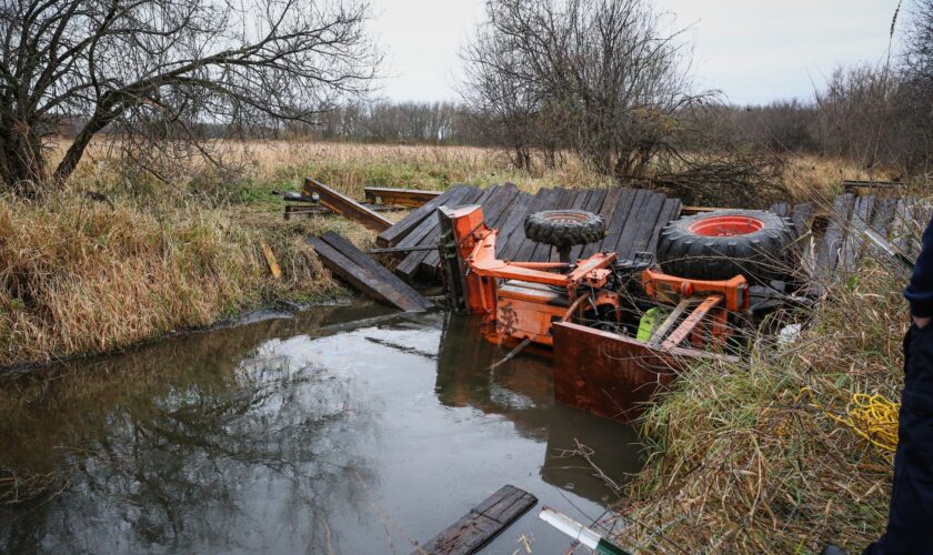 Illinois man rescued after bridge collapse causes tractor to trap him in creek