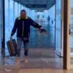 Spain floods latest: Barcelona Airport flooded as frantic search for survivors turns to underground car parks