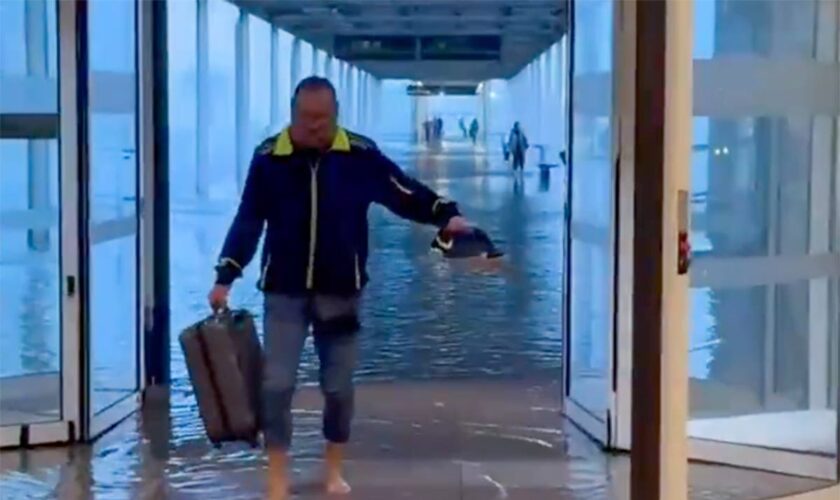 Spain floods latest: Barcelona Airport flooded as frantic search for survivors turns to underground car parks