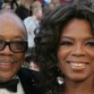 Music producer Quincy Jones (C), with his unidentified date and Oprah Winfrey (R), arrives at the 77th annual Academy Awards in Hollywood, February 27, 2005. REUTERS/Lucy Nicholson MM