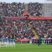 Players observe a minute's silence for the flood victims ahead of Barcelona v Espanyol on Sunday. Pic: AP