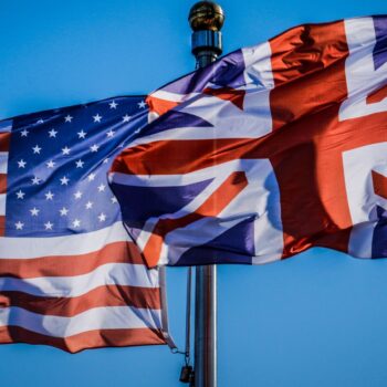 USA and UK flags together on the staff. Image: iStock