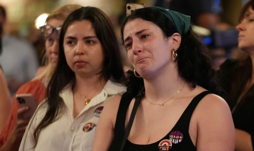 Supporters of Florida's Amendment 4, which would have enshrined abortion rights in the state, react after the amendment's defeat, during a watch party for the Yes On 4 campaign, on Election Day, Tuesday, Nov. 5, 2024, in St. Petersburg, Fla. (AP Photo/Rebecca Blackwell)