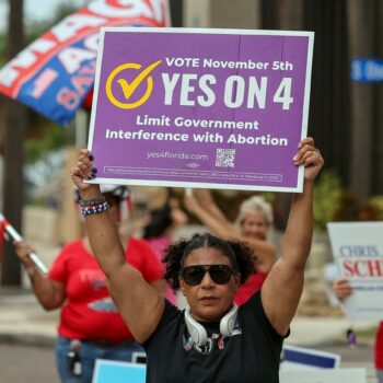 Beth Weinstein rallies in supporter of Yes on Amendment 4 regarding abortion in Florida outside of the polling place at the courthouse on Tuesday, Nov. 5, 2024, in Clearwater, Fla. (AP Photo/Mike Carlson)