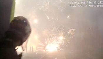 Shocking moment police duck for cover as teenagers launch fireworks in Manchester ‘warzone’