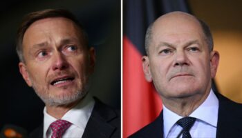 Outgoing German Finance Minister Christian Lindner (left) of the Free Democratic party (FDP) gives a statement at the Bundestag, Germany's lower house of parliament, after he was sacked by German Chancellor Olaf Scholz (right). November 6, 2024. Pic: REUTERS/Lisi Niesner TPX IMAGES OF THE DAY