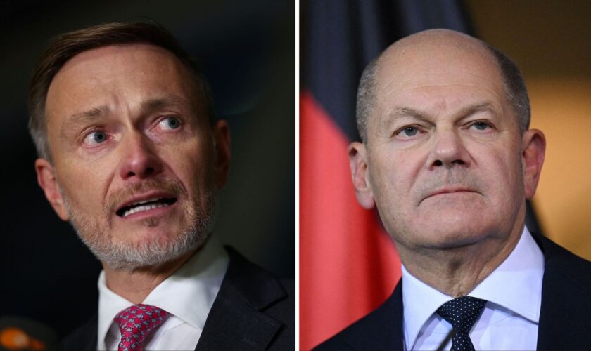 Outgoing German Finance Minister Christian Lindner (left) of the Free Democratic party (FDP) gives a statement at the Bundestag, Germany's lower house of parliament, after he was sacked by German Chancellor Olaf Scholz (right). November 6, 2024. Pic: REUTERS/Lisi Niesner TPX IMAGES OF THE DAY