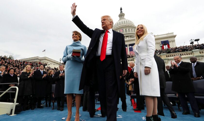 With wife Melania and daughter Tiffany at his 2017 inauguration. Pic: AP