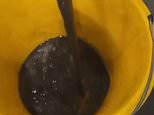 Have you ever sat down on the Tube? Shocking video shows bucket of black filth that cleaner extracted from just four seats on London Underground train