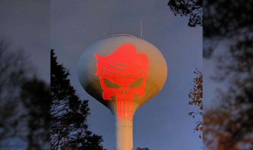 MAGA supporter sparks outrage after projecting Punisher logo with Trump’s hair on water tower