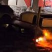 Spain hit by new flash floods: Freak torrential deluge sends cars floating down the street in Girona just over a week after 200 people died in Valencia disaster