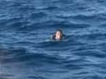 Twist in miracle survival of man who swam for 19 hours after falling off a cargo ship as three items are found strapped to his body