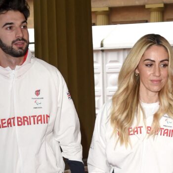 Zac Shaw and partner Ali Smith attend the Buckingham Palace event on Thursday. Pic: Reuters