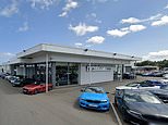 Woman 'raped in BMW car showroom' - as police arrest man, 34, in connection with alleged sexual assault