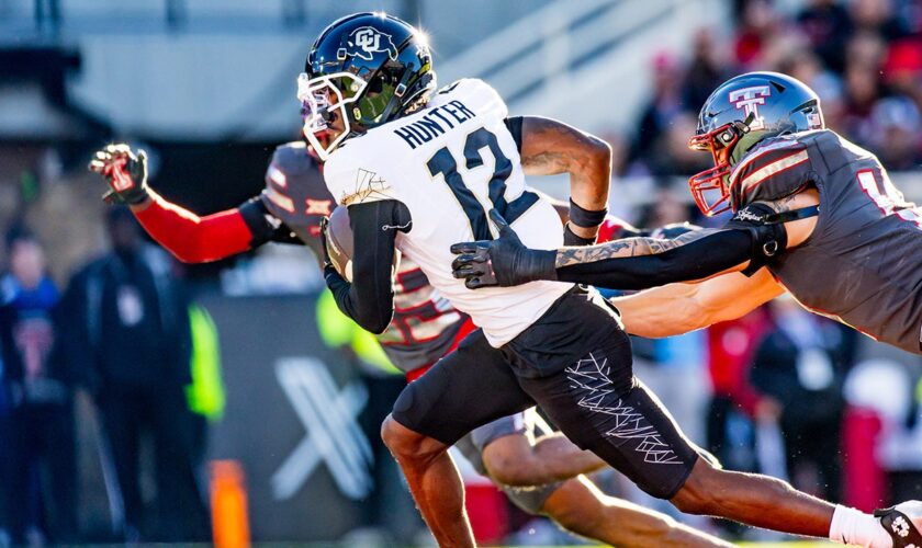 No. 20 Colorado stays alive for College Football Playoff as Heisman hopeful Travis Hunter continues dominance