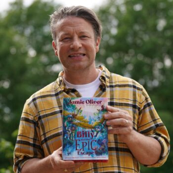 Jamie Oliver during a visit to Great Bradfords Junior School, in Braintree, Essex, as he launches his new book, Billy and the Epic Escape. Picture date: Thursday May 23, 2024.