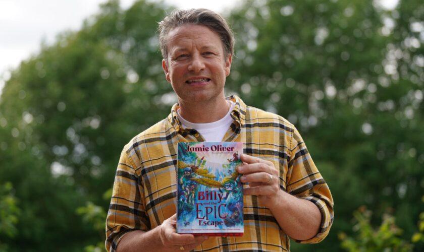 Jamie Oliver during a visit to Great Bradfords Junior School, in Braintree, Essex, as he launches his new book, Billy and the Epic Escape. Picture date: Thursday May 23, 2024.