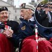 Britain remembers the glorious war dead: Hundreds of emotional veterans gather at the Cenotaph as the nation pays tribute on Remembrance Sunday to those who made the ultimate sacrifice