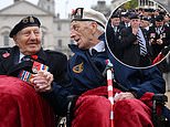 Britain remembers the glorious war dead: Hundreds of emotional veterans gather at the Cenotaph as the nation pays tribute on Remembrance Sunday to those who made the ultimate sacrifice